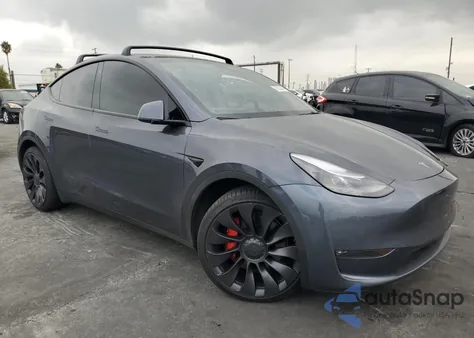 2022 Tesla Model Y из США, поврежденный, VIN 7SAYGDEF9NF405384